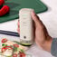 FoodSaver Mini Handheld Vacuum Sealer, Cordless Vacuum Sealer with Charging Dock, Oatmilk Image 2 of 7